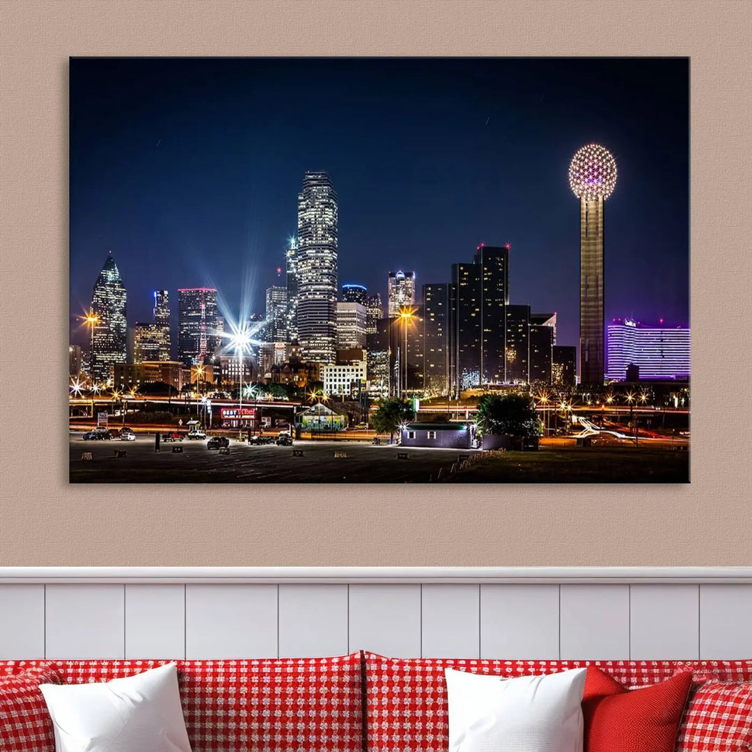 A living room showcases the Dallas City Lights Night Skyline Cityscape View Wall Art Canvas Print, a triptych photo of a city skyline at night on museum-quality canvas that is ready to hang.