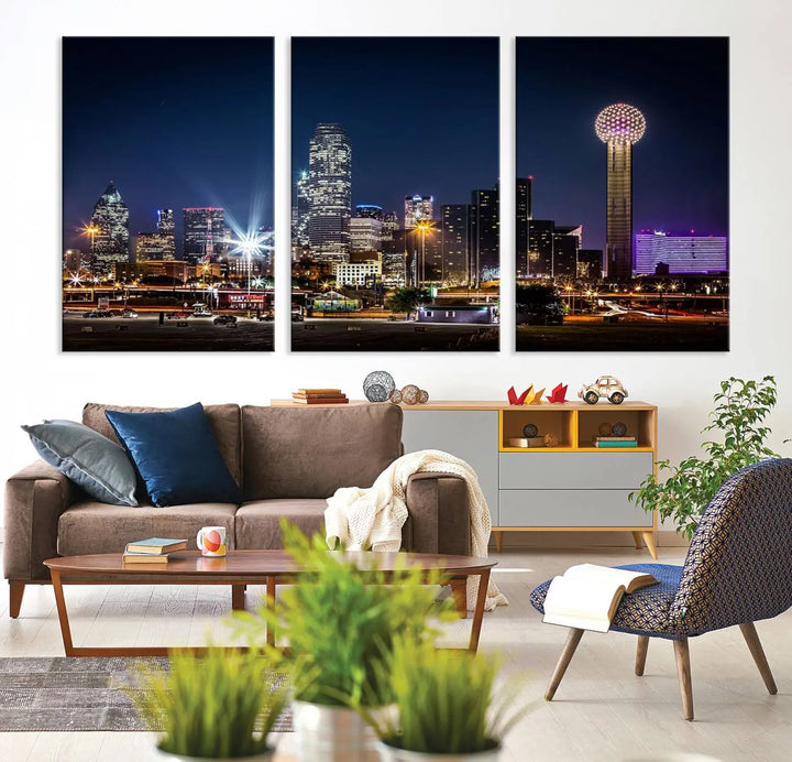 A living room showcases the Dallas City Lights Night Skyline Cityscape View Wall Art Canvas Print, a triptych photo of a city skyline at night on museum-quality canvas that is ready to hang.