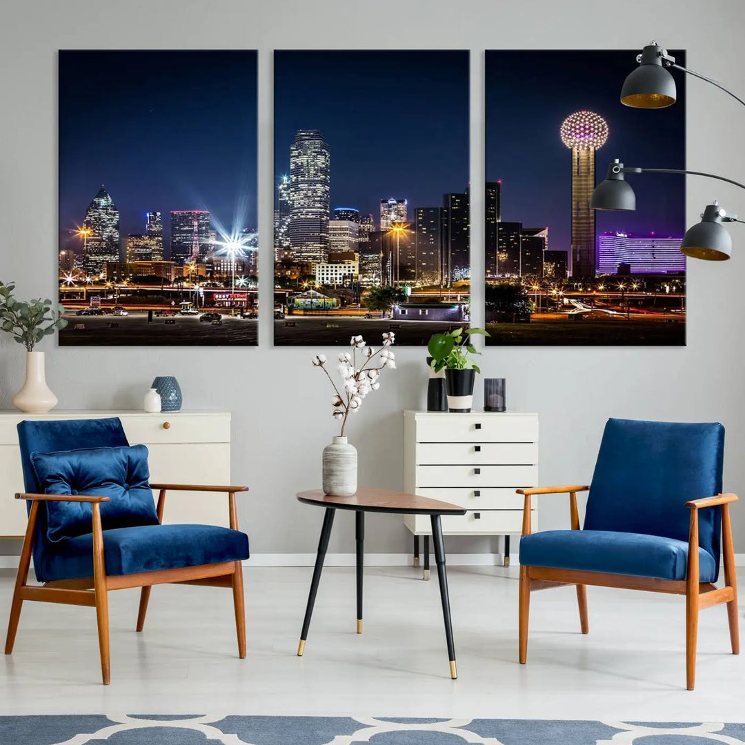 A living room showcases the Dallas City Lights Night Skyline Cityscape View Wall Art Canvas Print, a triptych photo of a city skyline at night on museum-quality canvas that is ready to hang.