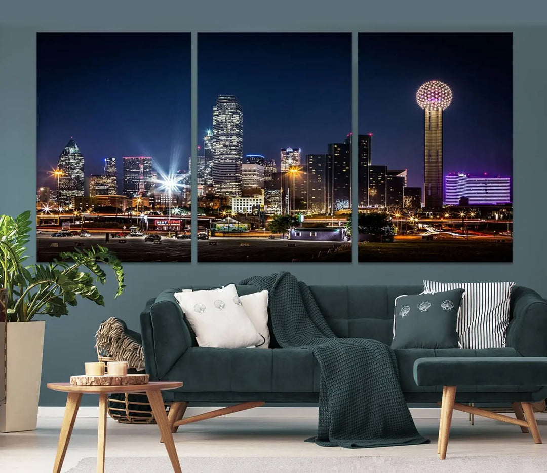 A living room showcases the Dallas City Lights Night Skyline Cityscape View Wall Art Canvas Print, a triptych photo of a city skyline at night on museum-quality canvas that is ready to hang.