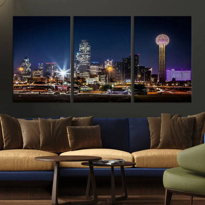 A living room showcases the Dallas City Lights Night Skyline Cityscape View Wall Art Canvas Print, a triptych photo of a city skyline at night on museum-quality canvas that is ready to hang.