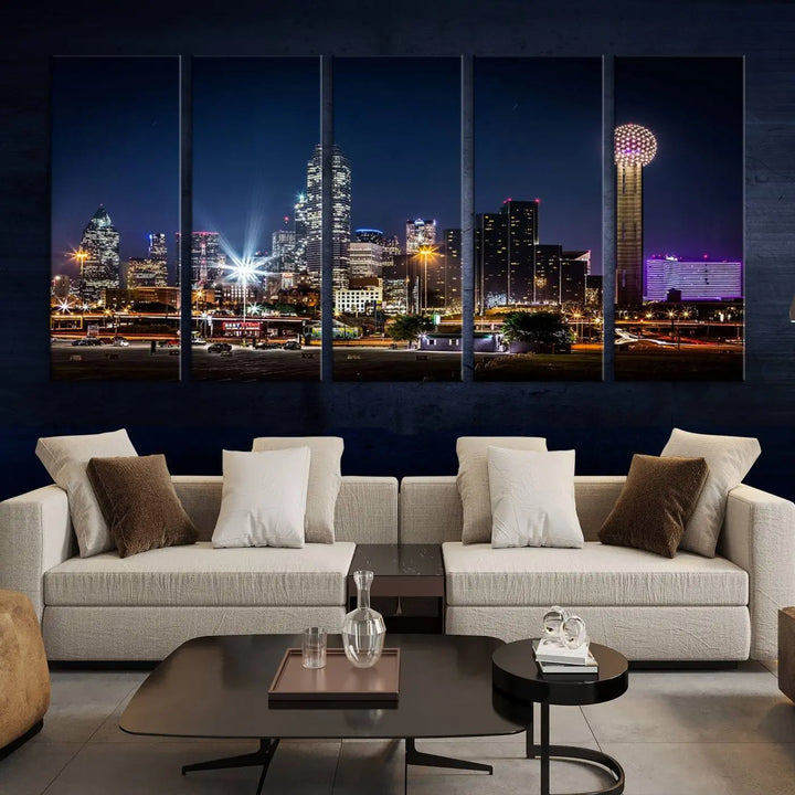 A living room showcases the Dallas City Lights Night Skyline Cityscape View Wall Art Canvas Print, a triptych photo of a city skyline at night on museum-quality canvas that is ready to hang.