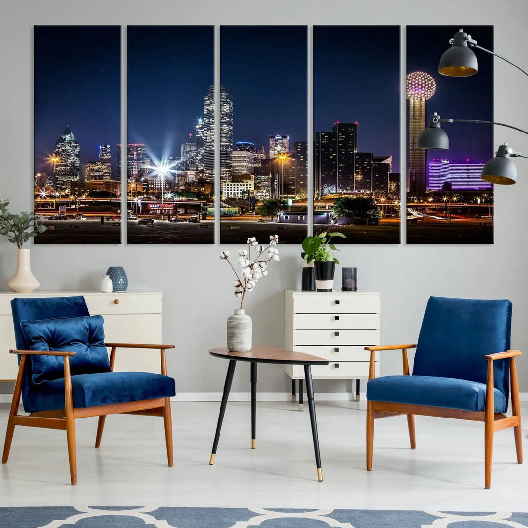 A living room showcases the Dallas City Lights Night Skyline Cityscape View Wall Art Canvas Print, a triptych photo of a city skyline at night on museum-quality canvas that is ready to hang.