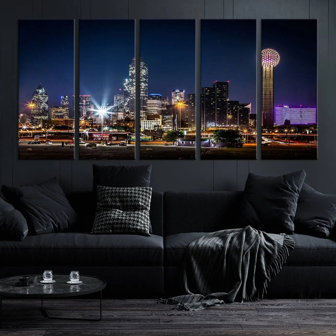 A living room showcases the Dallas City Lights Night Skyline Cityscape View Wall Art Canvas Print, a triptych photo of a city skyline at night on museum-quality canvas that is ready to hang.