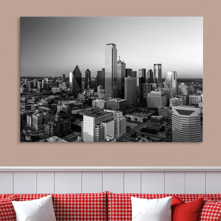 A modern living room showcases the Dallas City Lights Skyline Black and White Wall Art Cityscape Canvas Print. This gallery-wrapped piece offers a sleek finish and is crafted from museum-quality pollycotton. It features a UV-protective coating to ensure lasting vibrancy.