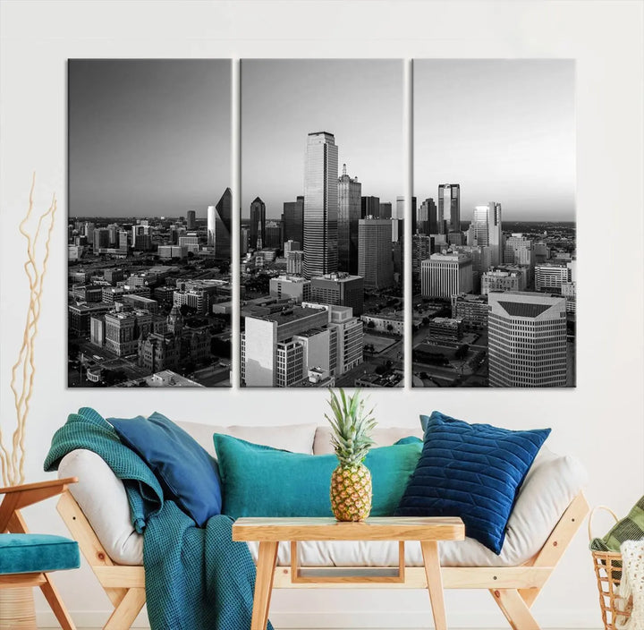 A modern living room showcases the Dallas City Lights Skyline Black and White Wall Art Cityscape Canvas Print. This gallery-wrapped piece offers a sleek finish and is crafted from museum-quality pollycotton. It features a UV-protective coating to ensure lasting vibrancy.