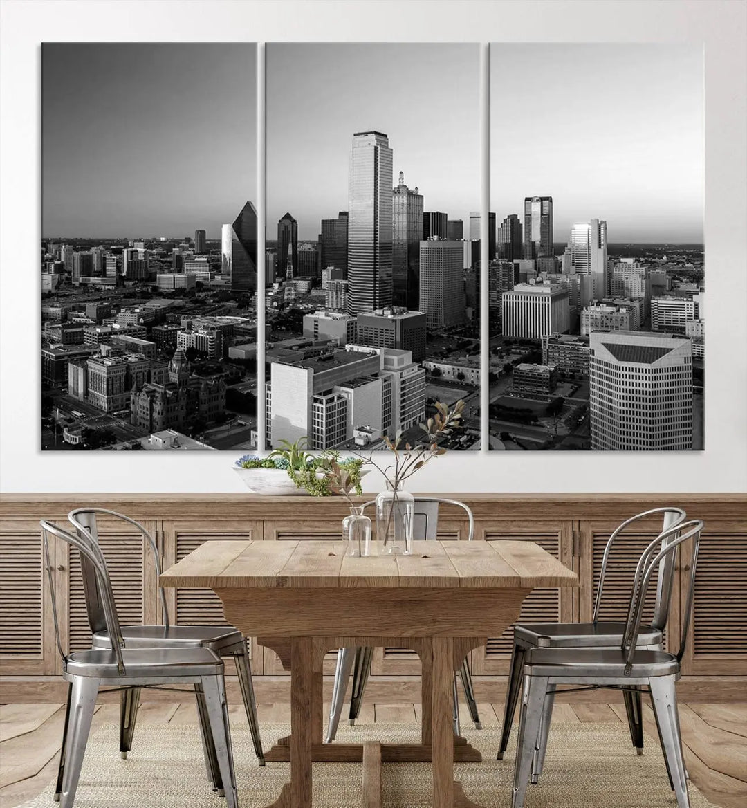 A modern living room showcases the Dallas City Lights Skyline Black and White Wall Art Cityscape Canvas Print. This gallery-wrapped piece offers a sleek finish and is crafted from museum-quality pollycotton. It features a UV-protective coating to ensure lasting vibrancy.