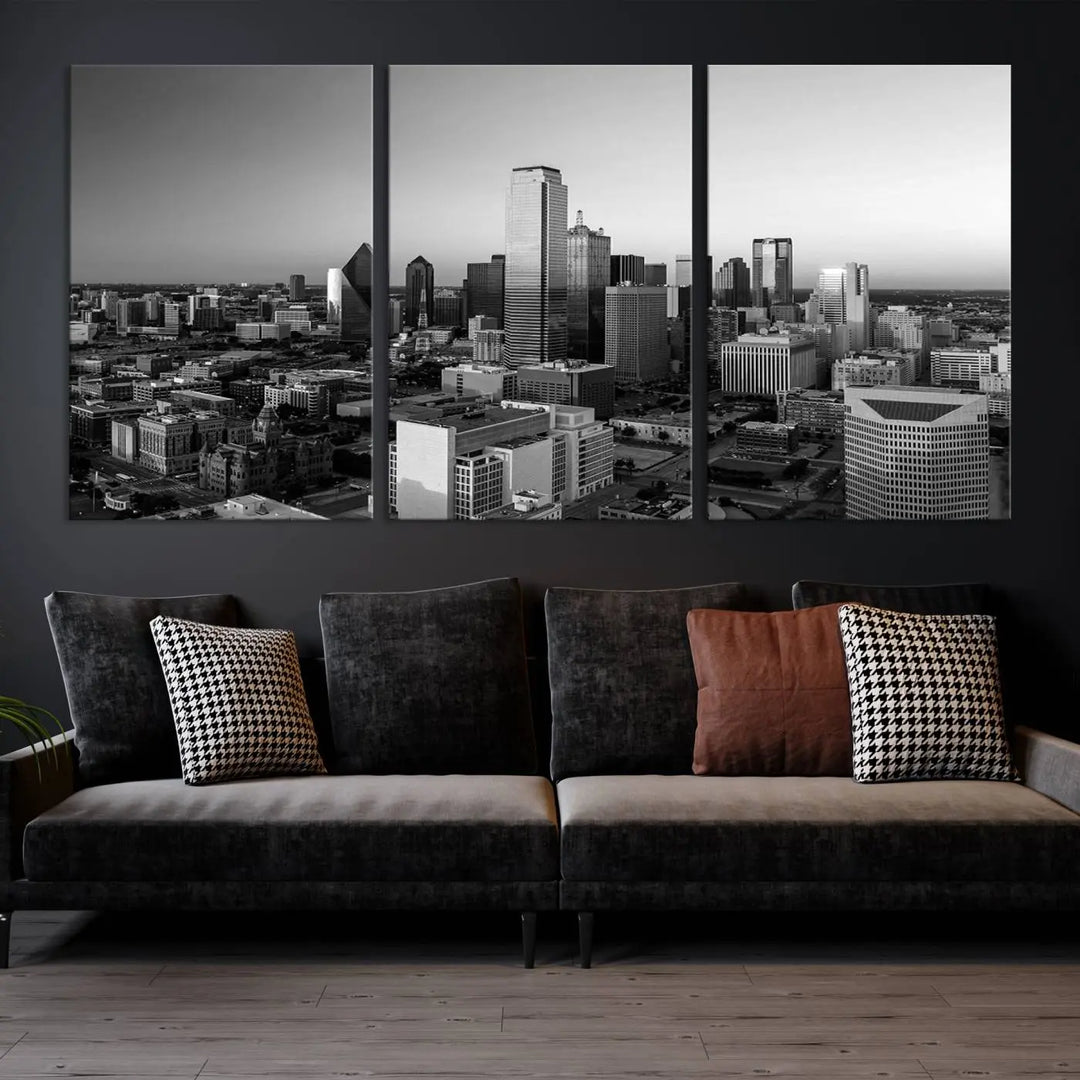 A modern living room showcases the Dallas City Lights Skyline Black and White Wall Art Cityscape Canvas Print. This gallery-wrapped piece offers a sleek finish and is crafted from museum-quality pollycotton. It features a UV-protective coating to ensure lasting vibrancy.