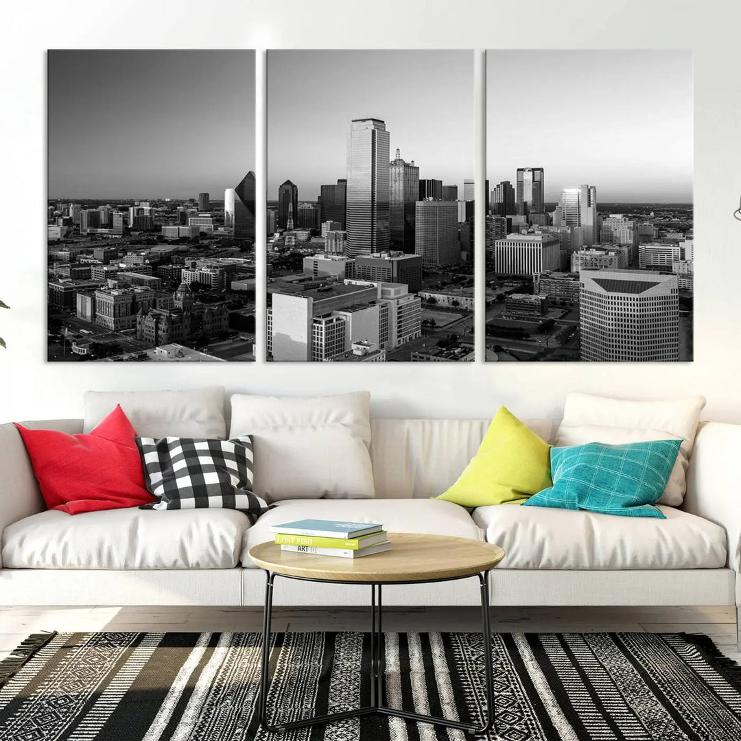 A modern living room showcases the Dallas City Lights Skyline Black and White Wall Art Cityscape Canvas Print. This gallery-wrapped piece offers a sleek finish and is crafted from museum-quality pollycotton. It features a UV-protective coating to ensure lasting vibrancy.