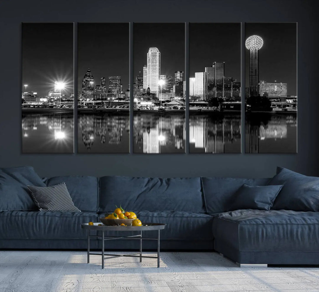 The living room showcases the Dallas City Lights Skyline Black and White Wall Art Cityscape Canvas Print. This museum-quality artwork is ready to hang and features a UV-protective coating to maintain its vibrant colors.