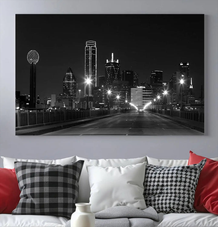 On the wall are three panels of the Dallas City Lights Skyline Black and White Wall Art Cityscape Canvas Print. These museum-quality, ready-to-hang pieces promise lasting vibrancy with their UV-protective coating.