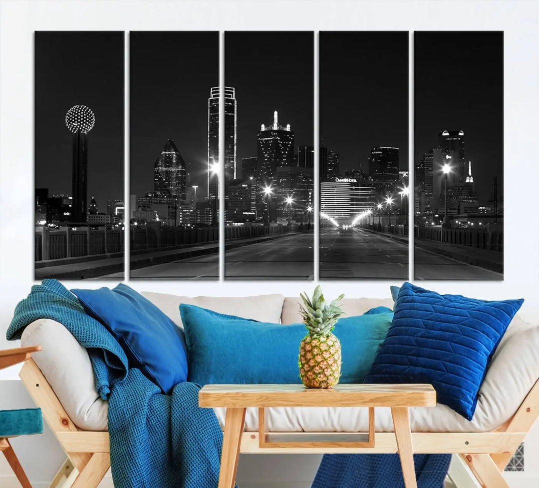 On the wall are three panels of the Dallas City Lights Skyline Black and White Wall Art Cityscape Canvas Print. These museum-quality, ready-to-hang pieces promise lasting vibrancy with their UV-protective coating.