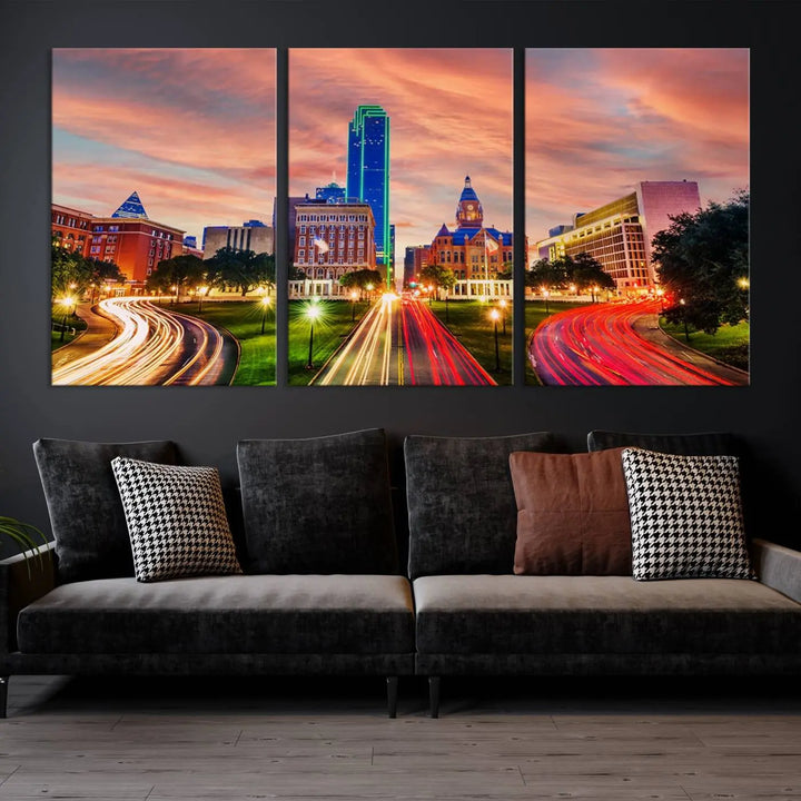 The "Dallas City Lights Sunset Orange Cloudy Skyline Cityscape View" wall art, exquisitely printed on museum-quality canvas and featuring a UV-protective coating, hangs on a dark wall.