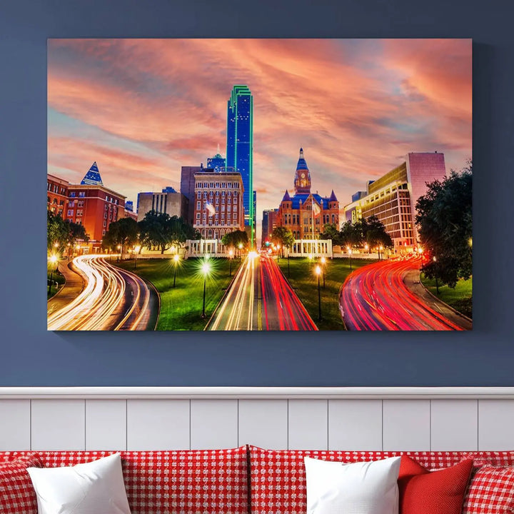 The "Dallas City Lights Sunset Orange Cloudy Skyline Cityscape View" wall art, exquisitely printed on museum-quality canvas and featuring a UV-protective coating, hangs on a dark wall.