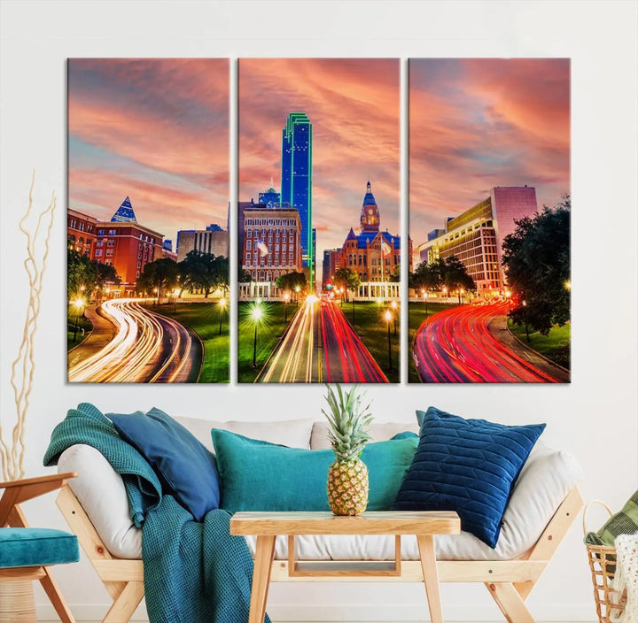 The "Dallas City Lights Sunset Orange Cloudy Skyline Cityscape View" wall art, exquisitely printed on museum-quality canvas and featuring a UV-protective coating, hangs on a dark wall.