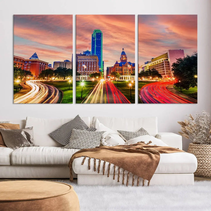 The "Dallas City Lights Sunset Orange Cloudy Skyline Cityscape View" wall art, exquisitely printed on museum-quality canvas and featuring a UV-protective coating, hangs on a dark wall.