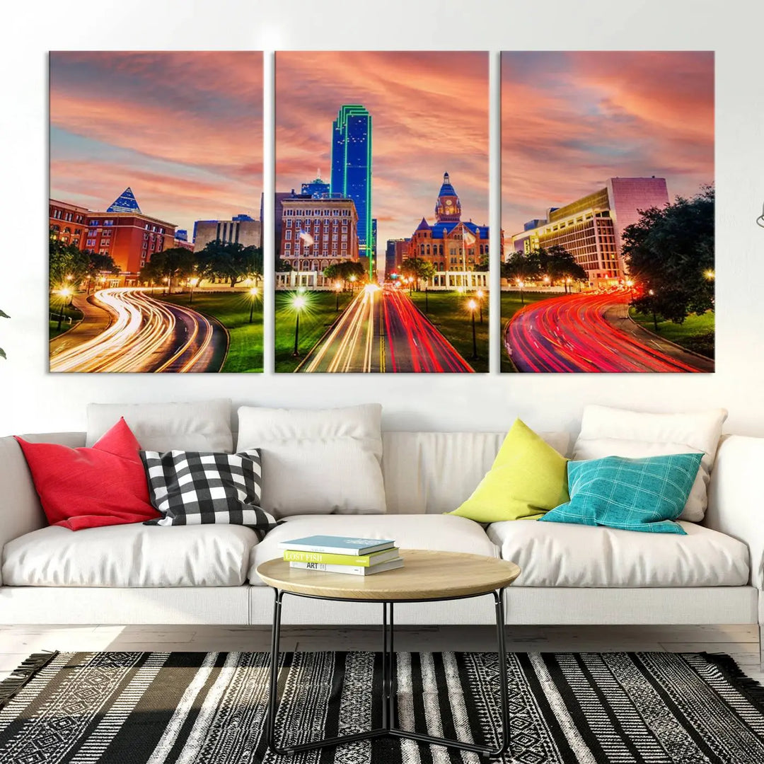 The "Dallas City Lights Sunset Orange Cloudy Skyline Cityscape View" wall art, exquisitely printed on museum-quality canvas and featuring a UV-protective coating, hangs on a dark wall.