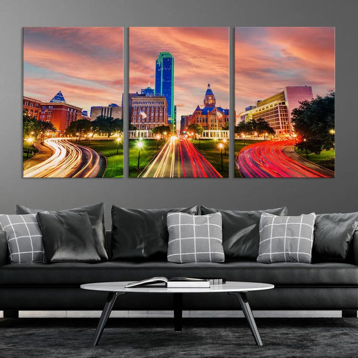 The "Dallas City Lights Sunset Orange Cloudy Skyline Cityscape View" wall art, exquisitely printed on museum-quality canvas and featuring a UV-protective coating, hangs on a dark wall.