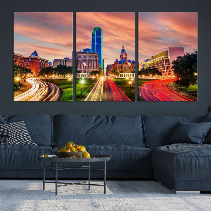 The "Dallas City Lights Sunset Orange Cloudy Skyline Cityscape View" wall art, exquisitely printed on museum-quality canvas and featuring a UV-protective coating, hangs on a dark wall.