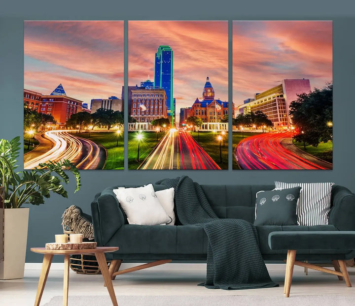 The "Dallas City Lights Sunset Orange Cloudy Skyline Cityscape View" wall art, exquisitely printed on museum-quality canvas and featuring a UV-protective coating, hangs on a dark wall.