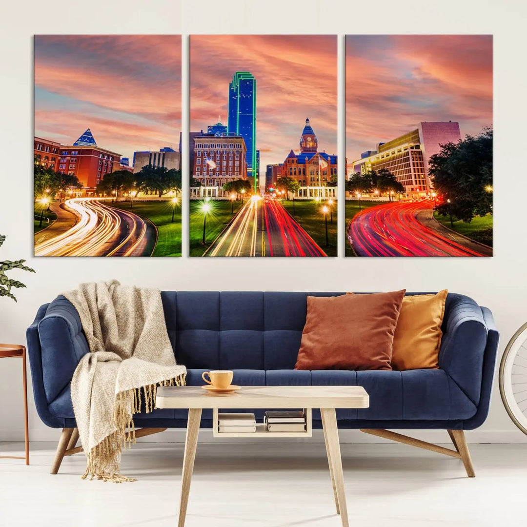 The "Dallas City Lights Sunset Orange Cloudy Skyline Cityscape View" wall art, exquisitely printed on museum-quality canvas and featuring a UV-protective coating, hangs on a dark wall.