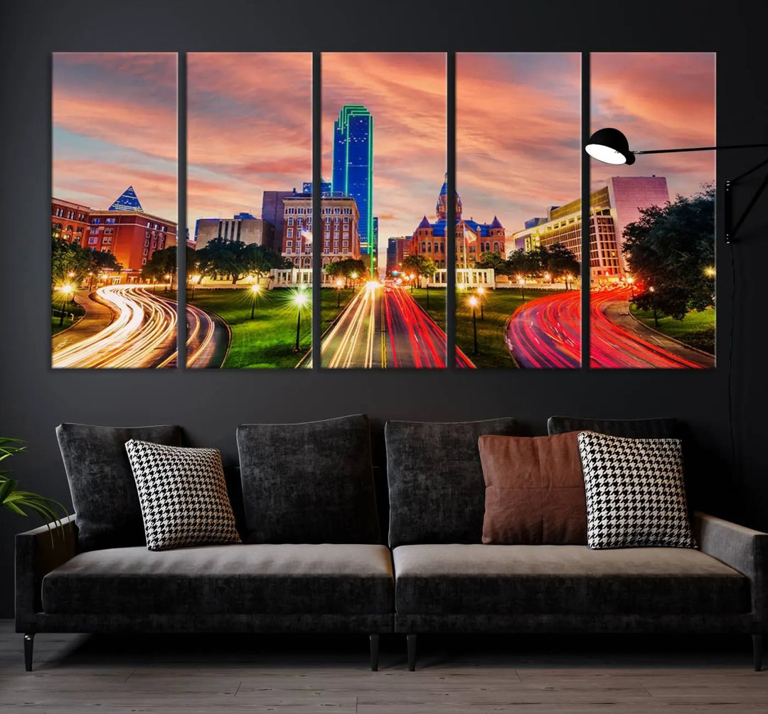 The "Dallas City Lights Sunset Orange Cloudy Skyline Cityscape View" wall art, exquisitely printed on museum-quality canvas and featuring a UV-protective coating, hangs on a dark wall.