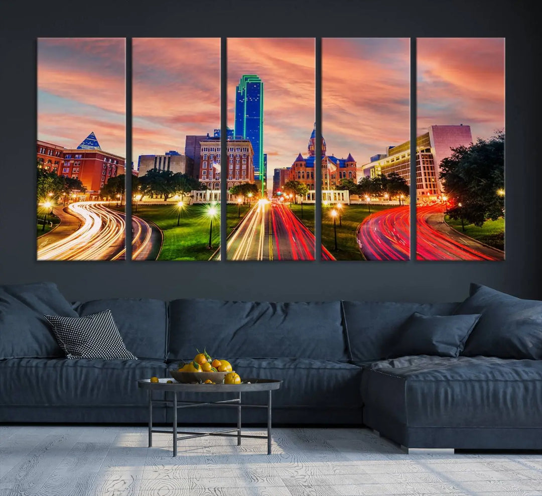 The "Dallas City Lights Sunset Orange Cloudy Skyline Cityscape View" wall art, exquisitely printed on museum-quality canvas and featuring a UV-protective coating, hangs on a dark wall.