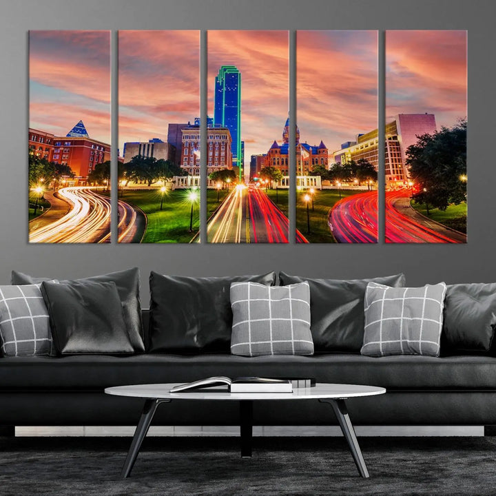 The "Dallas City Lights Sunset Orange Cloudy Skyline Cityscape View" wall art, exquisitely printed on museum-quality canvas and featuring a UV-protective coating, hangs on a dark wall.