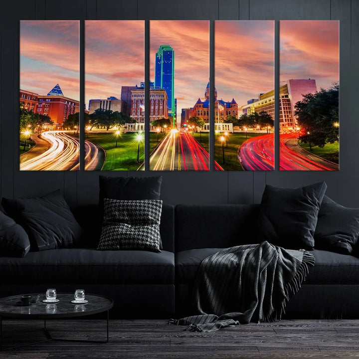 The "Dallas City Lights Sunset Orange Cloudy Skyline Cityscape View" wall art, exquisitely printed on museum-quality canvas and featuring a UV-protective coating, hangs on a dark wall.