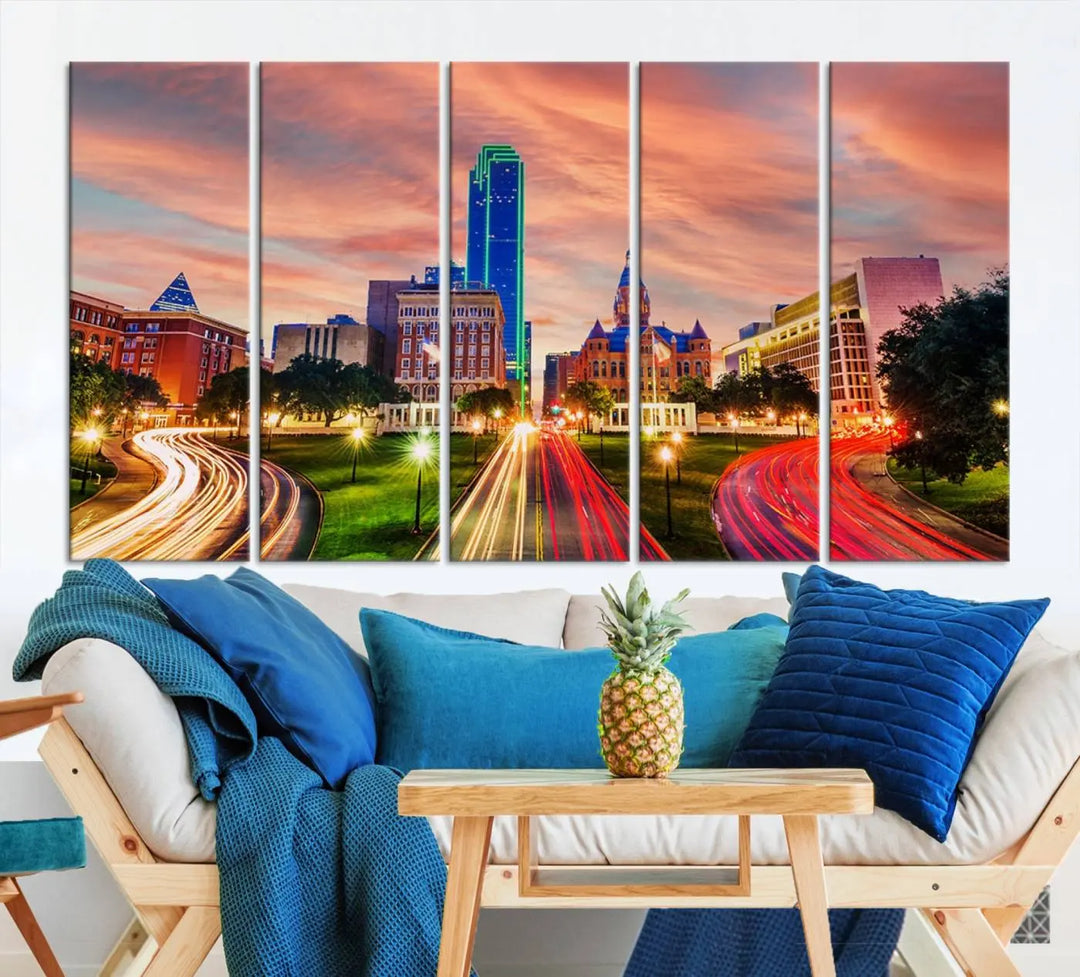 The "Dallas City Lights Sunset Orange Cloudy Skyline Cityscape View" wall art, exquisitely printed on museum-quality canvas and featuring a UV-protective coating, hangs on a dark wall.