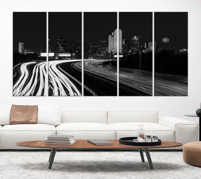 The "Dallas City Street Lights Skyline Black and White Wall Art Cityscape Canvas Print" features a triptych photo of a city skyline with light trails from cars on a highway. The images are gallery wrapped on museum-quality canvas, ensuring an elegant presentation and durability.