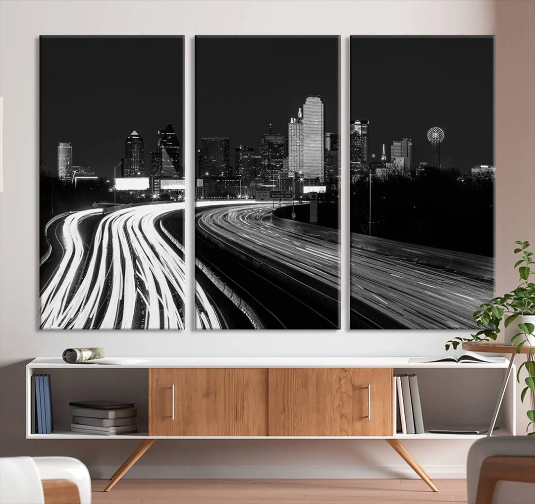 The Dallas City Street Lights Skyline Black and White Wall Art Cityscape Canvas Print features a triptych of a city skyline with light trails. Crafted on museum-quality canvas with a UV-protective coating, this ready-to-hang artwork enhances any contemporary space with its striking urban aesthetic.