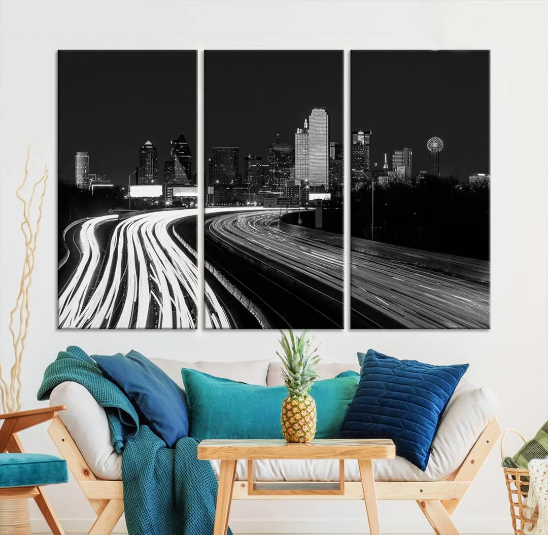 The Dallas City Street Lights Skyline Black and White Wall Art Cityscape Canvas Print features a triptych of a city skyline with light trails. Crafted on museum-quality canvas with a UV-protective coating, this ready-to-hang artwork enhances any contemporary space with its striking urban aesthetic.