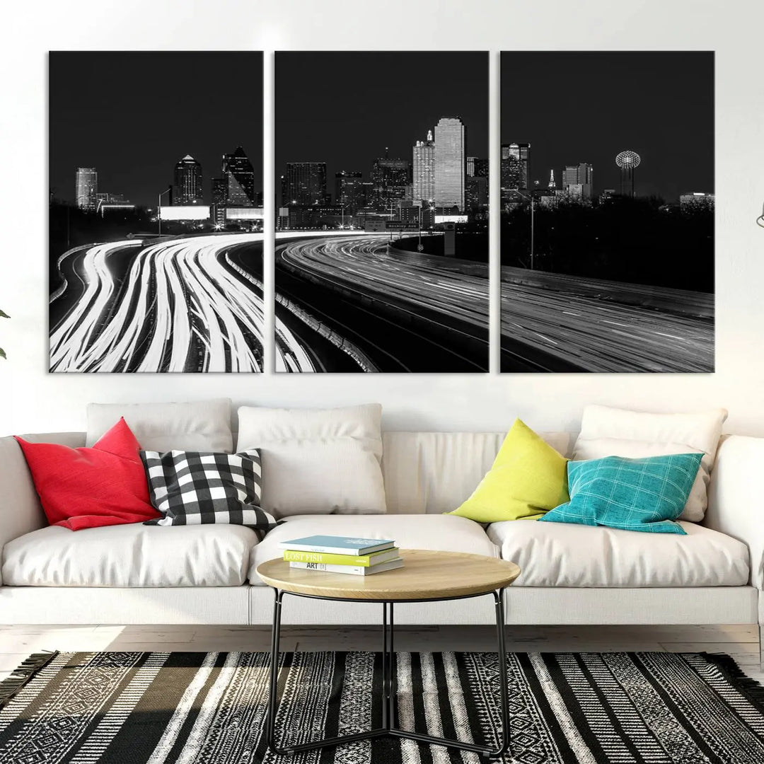 The Dallas City Street Lights Skyline Black and White Wall Art Cityscape Canvas Print features a triptych of a city skyline with light trails. Crafted on museum-quality canvas with a UV-protective coating, this ready-to-hang artwork enhances any contemporary space with its striking urban aesthetic.