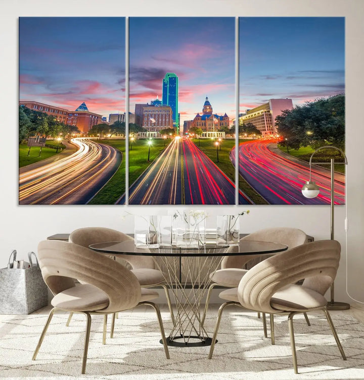 A modern living room features a cityscape triptych wall art titled "Dallas City Street Lights Sunset Pink Cloudy Skyline Cityscape View," printed on museum-quality canvas. It captures a vibrant evening skyline with light trails.