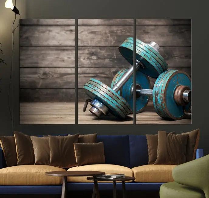 Adorn your walls with the Dambell and Sport Wall Art Canvas Print, showcasing teal dumbbells against rustic wooden panels for a touch of museum-quality elegance.