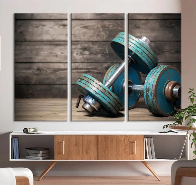 Adorn your walls with the Dambell and Sport Wall Art Canvas Print, showcasing teal dumbbells against rustic wooden panels for a touch of museum-quality elegance.