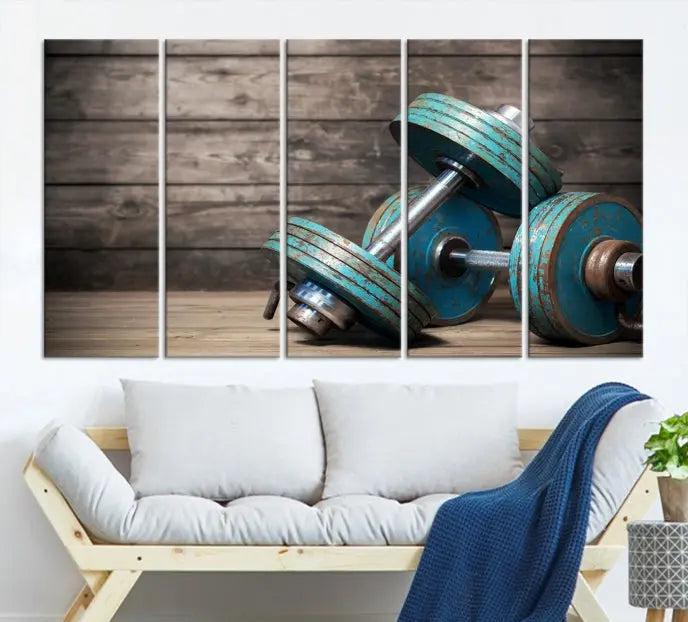 Adorn your walls with the Dambell and Sport Wall Art Canvas Print, showcasing teal dumbbells against rustic wooden panels for a touch of museum-quality elegance.