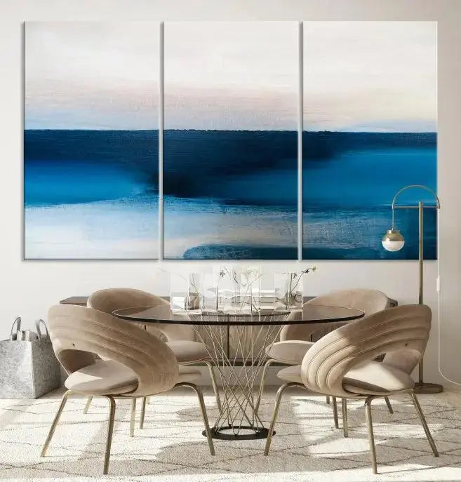 The living room is enhanced by the Dark Blue Abstract Wall Art Canvas Print, a triptych painting on hand-assembled framed canvas with UV-protective coating for enduring vibrancy.