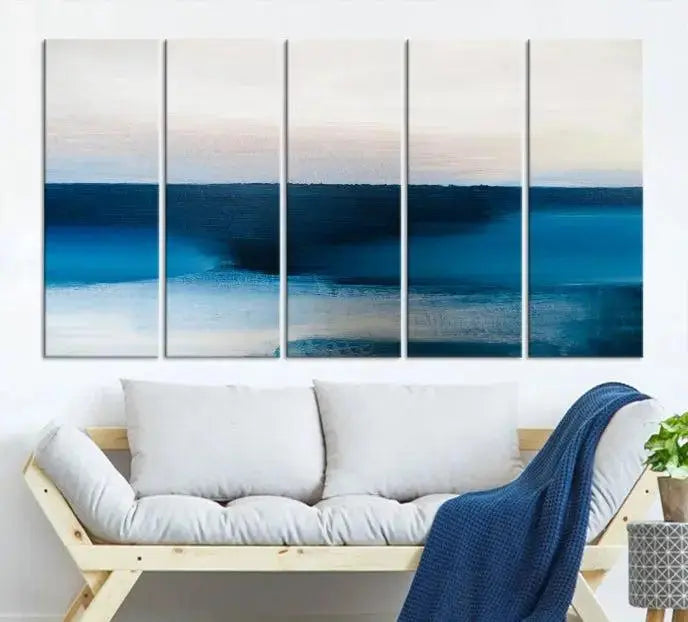 The living room is enhanced by the Dark Blue Abstract Wall Art Canvas Print, a triptych painting on hand-assembled framed canvas with UV-protective coating for enduring vibrancy.