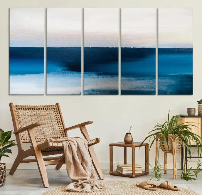 The living room is enhanced by the Dark Blue Abstract Wall Art Canvas Print, a triptych painting on hand-assembled framed canvas with UV-protective coating for enduring vibrancy.