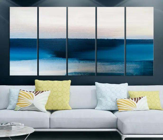 The living room is enhanced by the Dark Blue Abstract Wall Art Canvas Print, a triptych painting on hand-assembled framed canvas with UV-protective coating for enduring vibrancy.