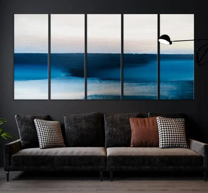 The living room is enhanced by the Dark Blue Abstract Wall Art Canvas Print, a triptych painting on hand-assembled framed canvas with UV-protective coating for enduring vibrancy.