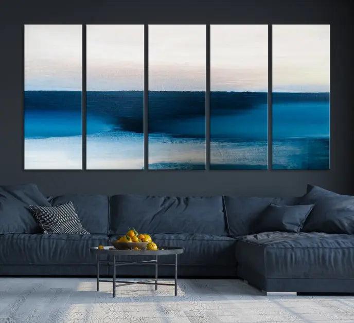 The living room is enhanced by the Dark Blue Abstract Wall Art Canvas Print, a triptych painting on hand-assembled framed canvas with UV-protective coating for enduring vibrancy.