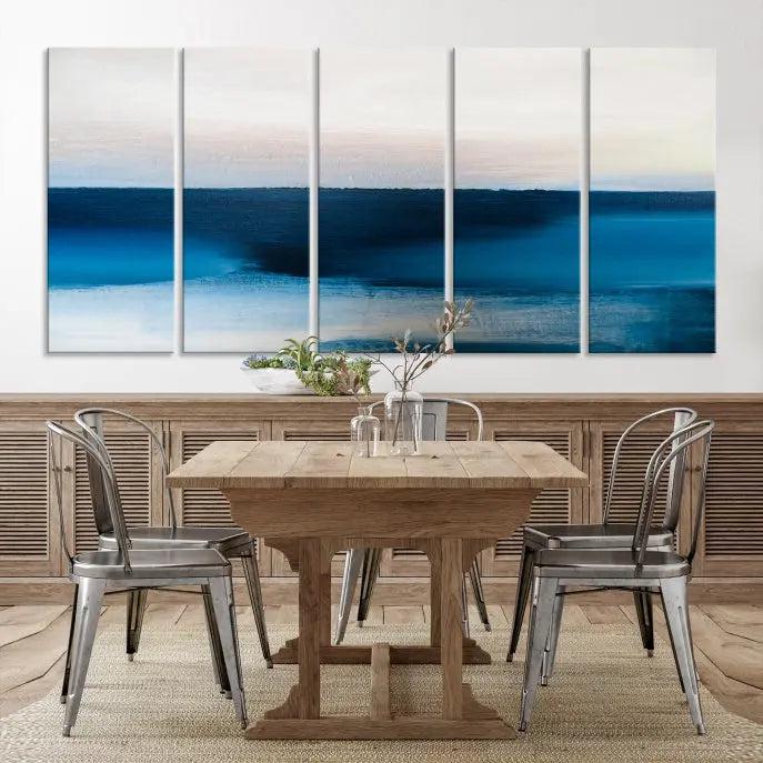 The living room is enhanced by the Dark Blue Abstract Wall Art Canvas Print, a triptych painting on hand-assembled framed canvas with UV-protective coating for enduring vibrancy.