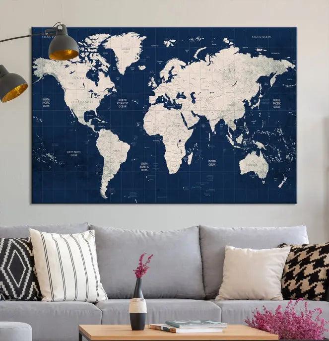 The modern living room is beautifully accented by the Dark Blue World Map Wall Art Canvas Print. This gallery-wrapped triptych features a dark blue backdrop that adds depth, creating a canvas of elegance on the wall.