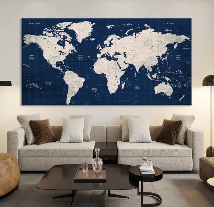 The modern living room is beautifully accented by the Dark Blue World Map Wall Art Canvas Print. This gallery-wrapped triptych features a dark blue backdrop that adds depth, creating a canvas of elegance on the wall.