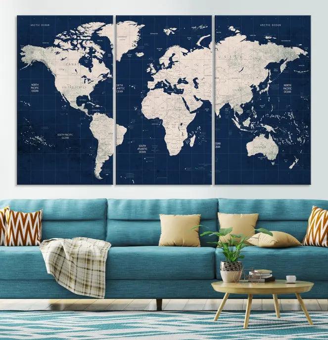 The modern living room is beautifully accented by the Dark Blue World Map Wall Art Canvas Print. This gallery-wrapped triptych features a dark blue backdrop that adds depth, creating a canvas of elegance on the wall.