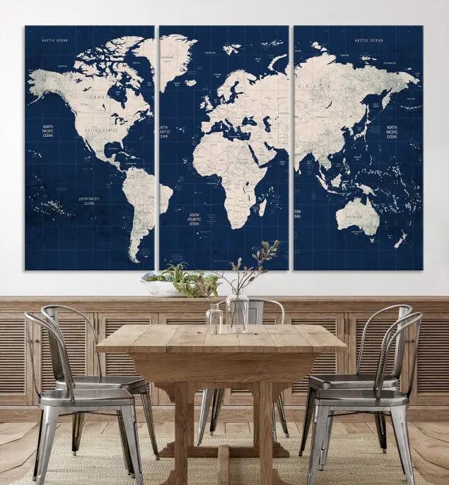 The modern living room is beautifully accented by the Dark Blue World Map Wall Art Canvas Print. This gallery-wrapped triptych features a dark blue backdrop that adds depth, creating a canvas of elegance on the wall.