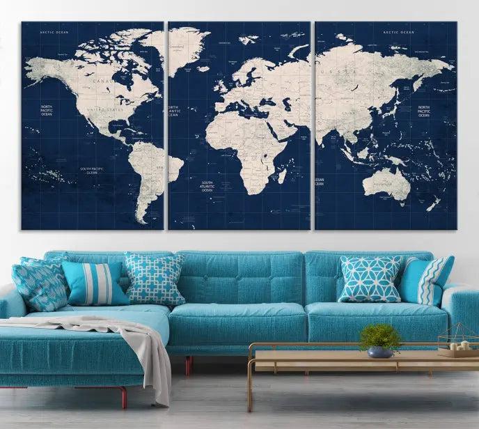 The modern living room is beautifully accented by the Dark Blue World Map Wall Art Canvas Print. This gallery-wrapped triptych features a dark blue backdrop that adds depth, creating a canvas of elegance on the wall.